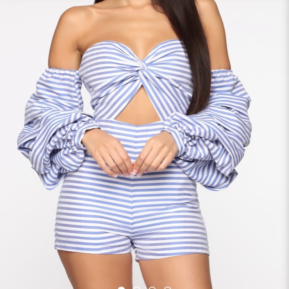 Romper, large but it fits like a medium.